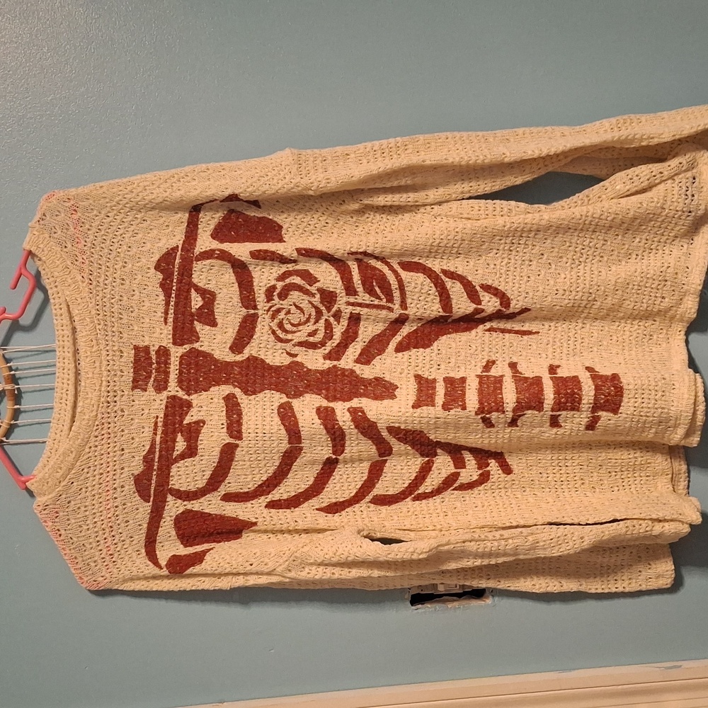 A Classy Chic Boutique Cream and Red Skeleton Long Sleeve Top